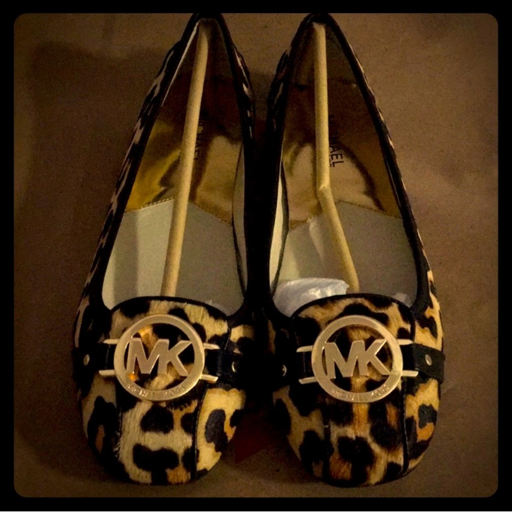 Nice MK Pair of flats.  Used only one time. Size 7.5 Leopard style.